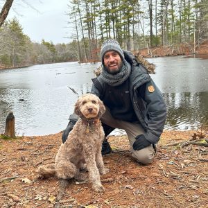 Darin Saw-Bellisario with dog